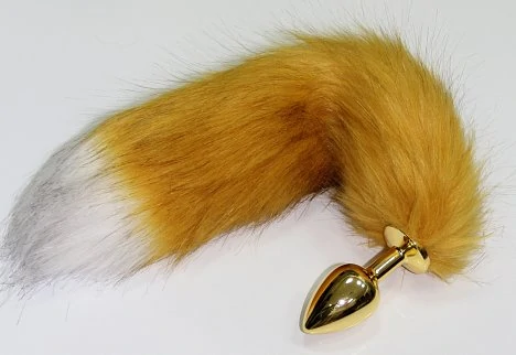 Пробка анальная стальная золотистая с длинным желтым хвостом. 